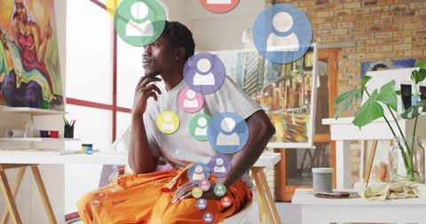 Creative african american artist in vibrant studio setting