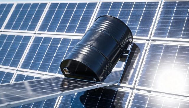 Black Steel Drum Leaning on Solar Panel Array Reflecting Sunlight and Industrial Contrast