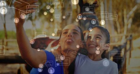 Fun mother daughter moments outdoors with virtual chat icons