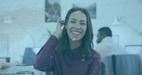 Smiling Woman in Modern Office with Digital Overlay