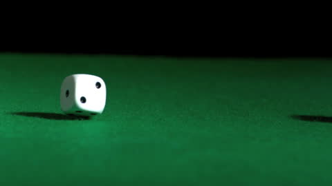 Rolling Dice on Green Casino Table for Gambling Concepts