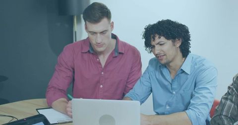 Team Members Collaborating in Modern Office Setting