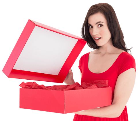 Surprised woman in red dress opening transparent gift box