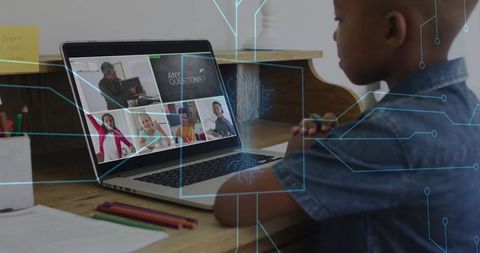 Young student attending virtual classroom on laptop at home desk with digital learning overlay