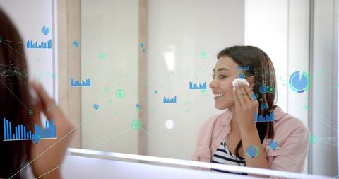 Young woman using smart mirror for skincare routine with augmented reality data overlays