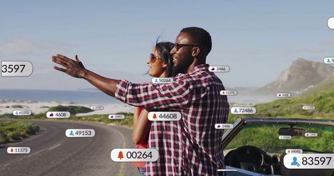 Couple on Scenic Coastal Drive Exploring Opportunities