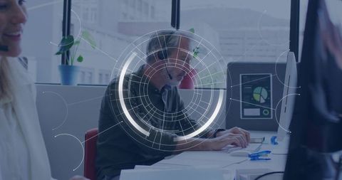 Customer support agent typing with headset in modern open office showing data hud overlay