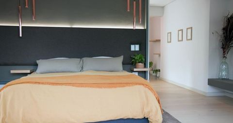 Modern Bedroom with Subtle Lighting and Elegant Decor