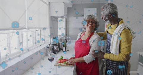 Senior African American Couple Cooking in Kitchen with Social Network Overlay