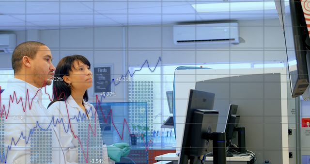 Scientists Analyzing Data on Multiple Monitors in Laboratory - Download Free Stock Images Pikwizard.com