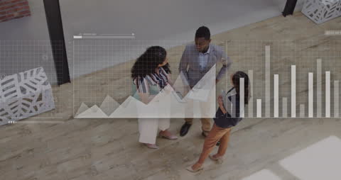 Diverse Team Engaging in Data-Driven Discussion in Modern Office