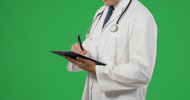 Caucasian doctor reviews medical records, with copy space. Office setting is implied by the professional attire and clipboard.