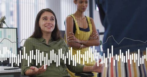Woman gesturing in collaborative business meeting