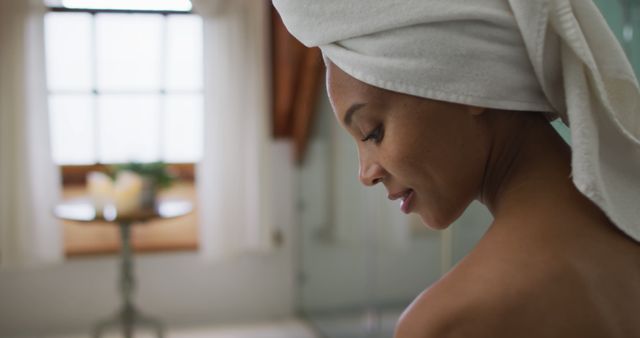 Woman with Towel Wrapped Hair Relaxing After Shower - Download Free Stock Images Pikwizard.com