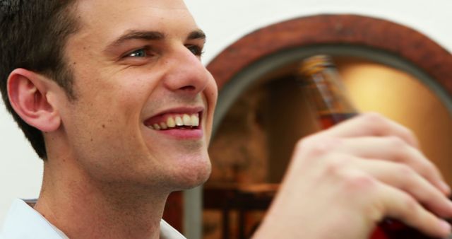 Man Enjoying Beer in Social Setting - Download Free Stock Images Pikwizard.com