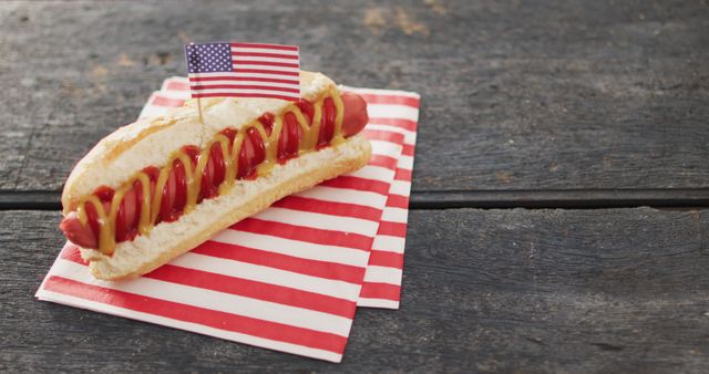 Image of hot dog with mustard and ketchup with flag of usa on a wooden surface. food, cuisine and catering ingredients.