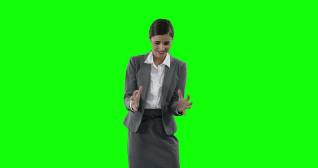 Businesswoman Interacting with Virtual Object on Green Screen Background - Download Free Stock Images Pikwizard.com
