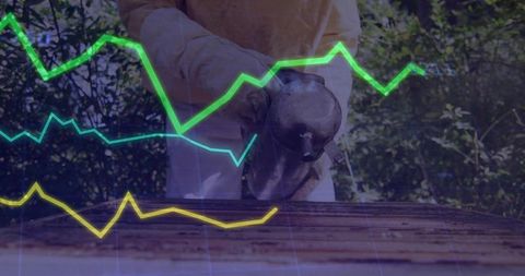 Beekeeper in Protective Gear Holding Smoker with Digital Business Charts