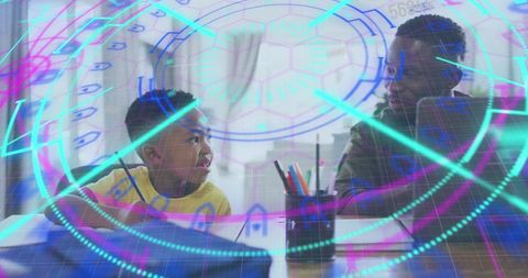 Father and Son Engaging in Digital Learning Experience