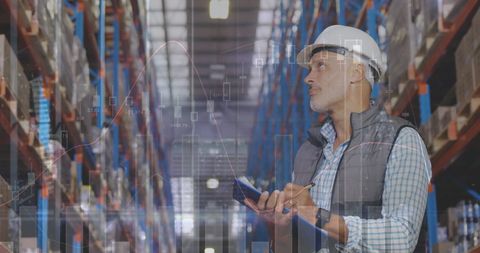 Warehouse Manager Analyzing Logistics Data in Large Facility - Download Free Stock Images Pikwizard.com