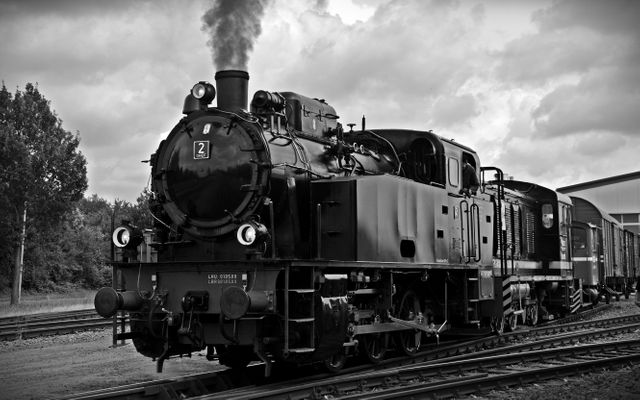 Train on Railroad Tracks Against Sky - Download Free Stock Photos Pikwizard.com