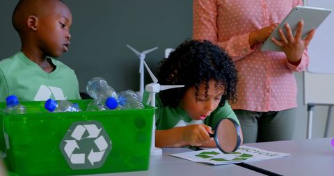 Young Students Learning About Recycling and Green Energy in Classroom - Download Free Stock Images Pikwizard.com