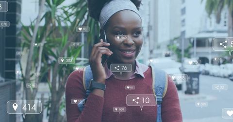 Smiling Woman Connecting on Smartphone with Social Media Icons
