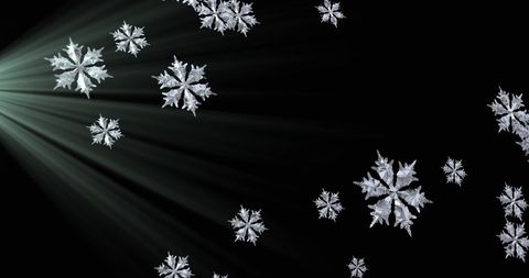 radiant snowflakes on black background with light trails - Download Free Stock Images Pikwizard.com