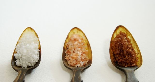 Three Types of Salt in Rustic Spoons on White Background - Download Free Stock Images Pikwizard.com