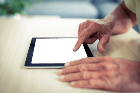 Hands Using Tablet on Wooden Table with Transparent Screen - Download Free Stock Videos Pikwizard.com