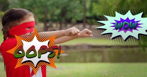 Young girl playing superhero in park with comic pop-art overlays oops wow
