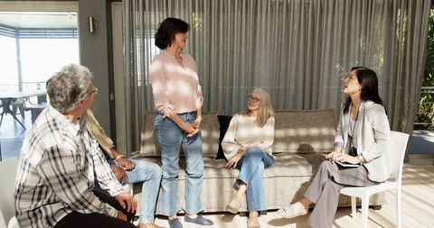 Diverse Group Therapy Session Focused on Communication and Healing