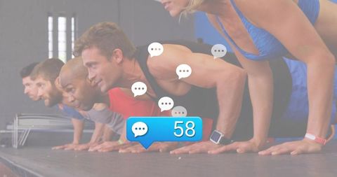 Five adults doing push-ups with social notification bubble showing 58, team fitness training
