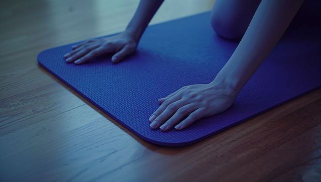 Peaceful Yoga Practice on Blue Mat for Relaxation and Mindfulness