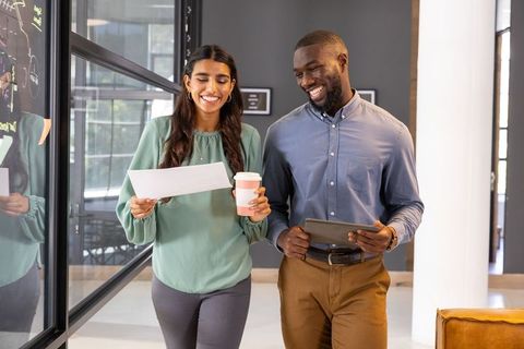 Diverse Professionals Collaborate in Modern Corporate Office