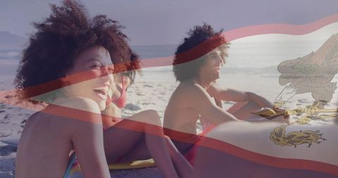 Friends enjoying relaxation at sunny beachside