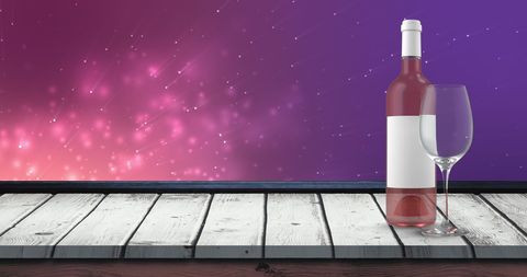 Rosé Wine Bottle and Glass on Vibrant Background - Download Free Stock Images Pikwizard.com
