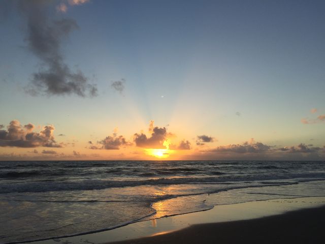 Peaceful Sunset Over Ocean Horizon With Reflected Sky - Download Free Stock Photos Pikwizard.com