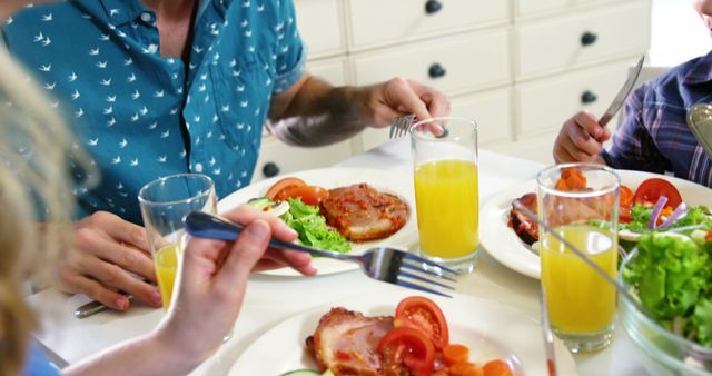 Family Enjoying Healthy Breakfast Together - Download Free Stock Images Pikwizard.com