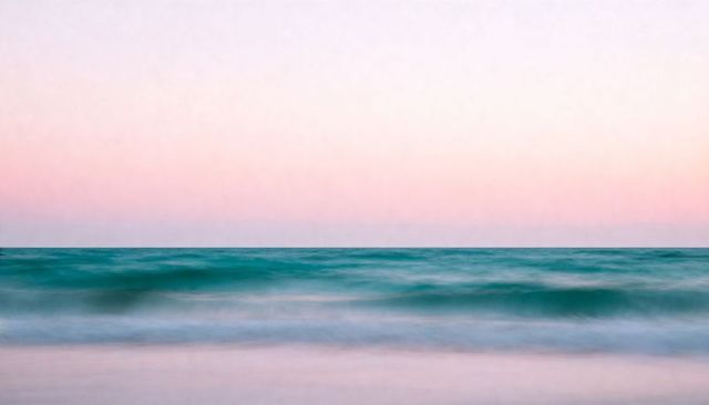 Turquoise ocean meeting pastel sky minimalist seascape sunrise with gentle waves