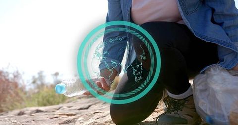 Volunteer engages in environmental cleanup with eco-friendly approach