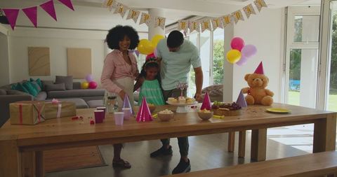 Diverse Family Celebrating Birthday with Joyful Decorations