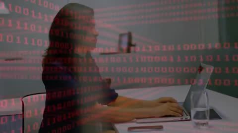 Woman Typing on Laptop with Binary Code Overlay in Office