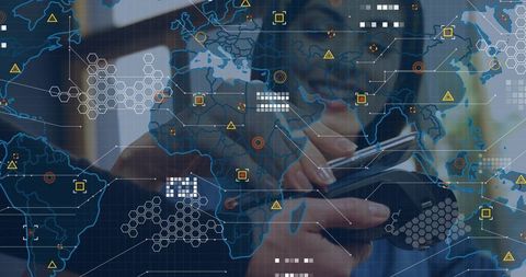 Businessman holding smartphone and using stylus with global network data overlay analytics