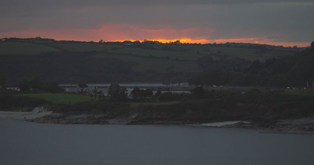 Sunset over Rolling Hills and Serene Lake - Download Free Stock Photos Pikwizard.com