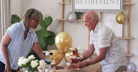 Senior Man Celebrating Retirement with Family and Friends