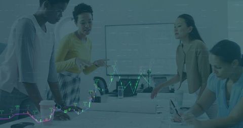 Diverse Team Analyzing Data and Financial Trends in Modern Office - Download Free Stock Images Pikwizard.com
