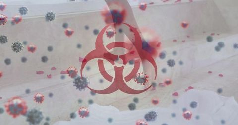 Biohazard symbol overlaying contaminated area with viral particles