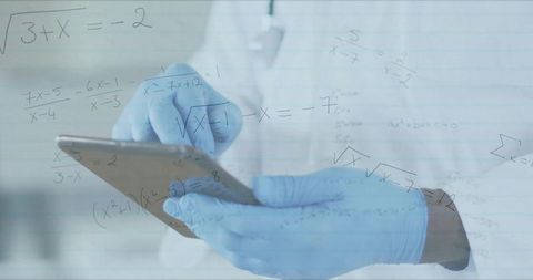 Scientist using digital tablet with math equations overlay