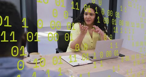 Businesswoman Discussing Data and Technology in Modern Office